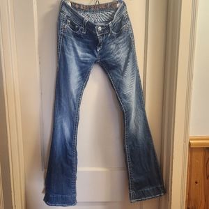 Rock Revival jeans.  26" waist, hemmed to 29.5" can be let out another 4".